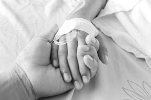 mother-holding-childs-hand-who-260nw-232137526